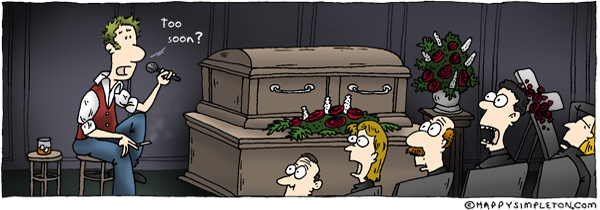 Description: Comedian up front at a funeral. Caption: Too soon?